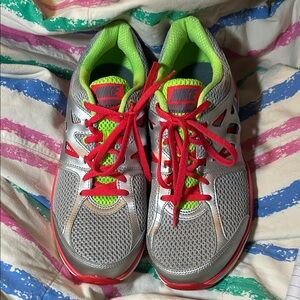 Nike Silver Running Shoes with Neon Green Lining and Red Laces
